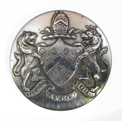 25-5.1.1 Coats of arms only (must have family shield) - achievement shield, crest (Papal mitre on a torse), supporters, motto on banner - silver-plated copper - 1 &3/16"
