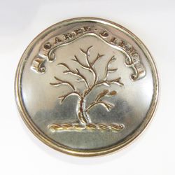 25-5.2.2.3 Plants (corresponds to Sec. 19 - Trees) - Leafless tree in winter surmounting a torse with family motto on a banner - silver-plated copper - 1"